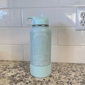 Hawaii water bottle with boot and straw lid